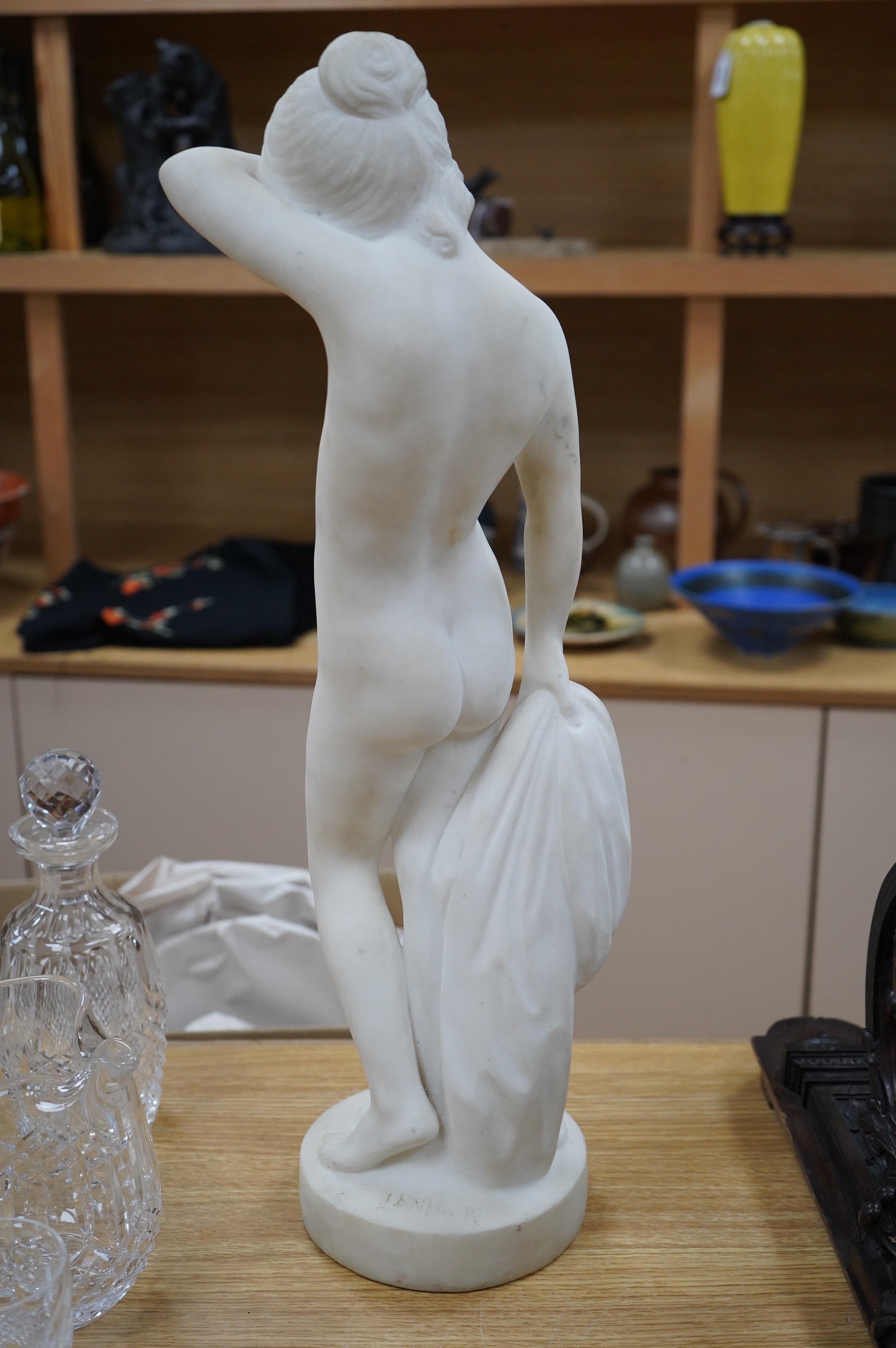 Lenhoir. A Carrara marble figure of a standing maiden, signed, 64cm high. Condition - fair to good
